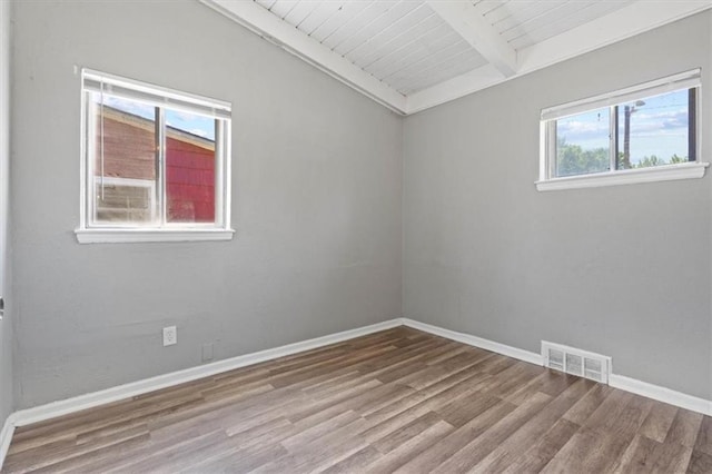 16 W 89th Ter, Kansas City, MO 64114 - unfurnished room featuring wood finished floors, baseboards, and wooden ceiling