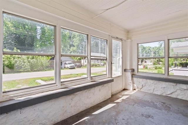11412 E 20th St S, Independence, MO 64052 - unfurnished sunroom featuring concrete floors