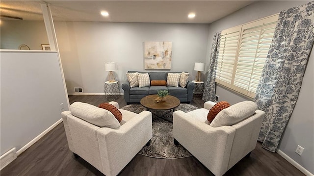 12909 E 40th St S, Independence, MO 64055 - living room with wood finished floors, baseboards, and recessed lighting