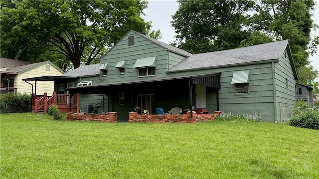 12909 E 40th St S, Independence, MO 64055 - back of house with a shingled roof