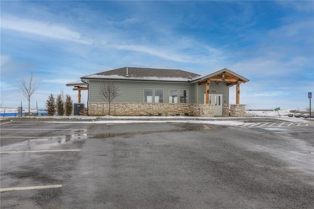 15443 W 171st Pl, Olathe, KS 66062 - view of front of property featuring stone siding and uncovered parking