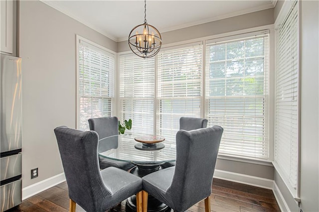 13125 Sherwood St, Leawood, KS 66209 - dining area with plenty of natural light, a chandelier, dark wood-type flooring, and crown molding