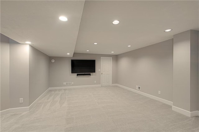 13125 Sherwood St, Leawood, KS 66209 - finished basement featuring recessed lighting and light carpet