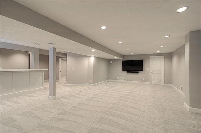 13125 Sherwood St, Leawood, KS 66209 - finished below grade area with light colored carpet and recessed lighting