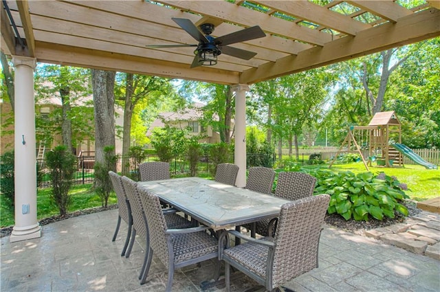 13125 Sherwood St, Leawood, KS 66209 - fenced backyard with a pergola, a patio area, a playground, ceiling fan, and outdoor dining space