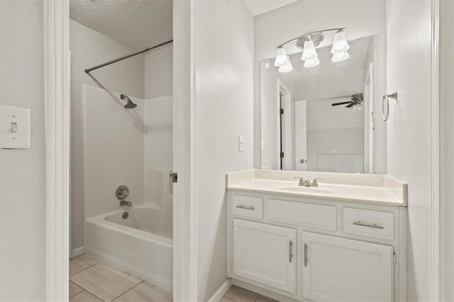 10118 E 220th St, Peculiar, MO 64078 - full bath with vanity, tile patterned floors, shower / washtub combination, a textured ceiling, and a ceiling fan