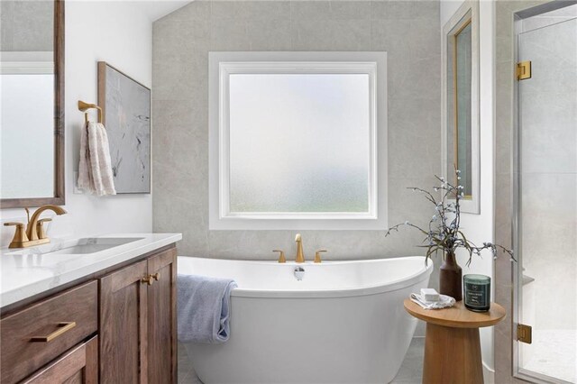 8009 Round Prairie St, Shawnee, KS 66220 - full bath with a freestanding bath and vanity