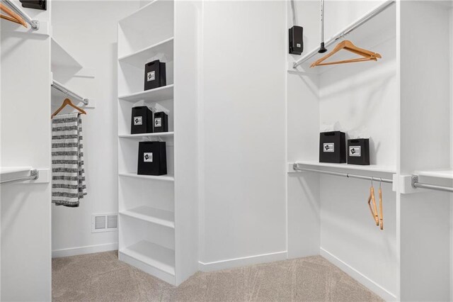 8009 Round Prairie St, Shawnee, KS 66220 - walk in closet featuring carpet