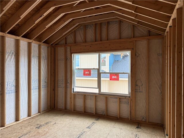 8009 Round Prairie St, Shawnee, KS 66220 - unfurnished room with vaulted ceiling