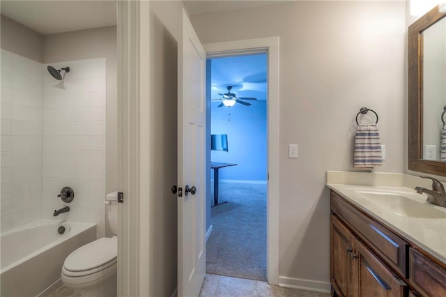 17304 S Schweiger Dr, Olathe, KS 66062 - full bath featuring vanity, toilet, shower / bathtub combination, baseboards, and ceiling fan