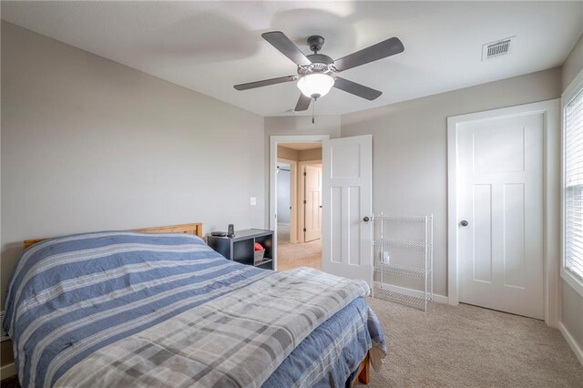 17304 S Schweiger Dr, Olathe, KS 66062 - bedroom with carpet floors, baseboards, and a ceiling fan