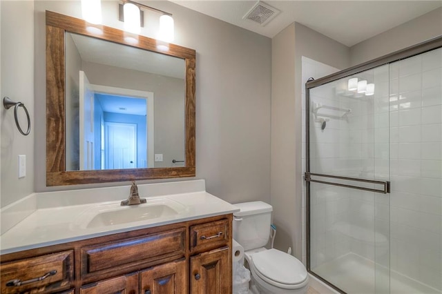 17304 S Schweiger Dr, Olathe, KS 66062 - full bathroom featuring toilet, vanity, and a shower stall