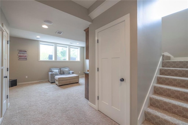 17304 S Schweiger Dr, Olathe, KS 66062 - living area featuring stairs, light carpet, baseboards, and recessed lighting