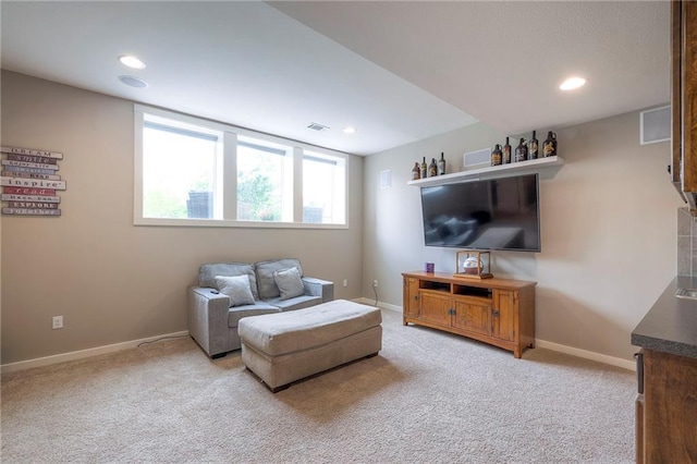 17304 S Schweiger Dr, Olathe, KS 66062 - living room featuring light carpet, baseboards, and recessed lighting