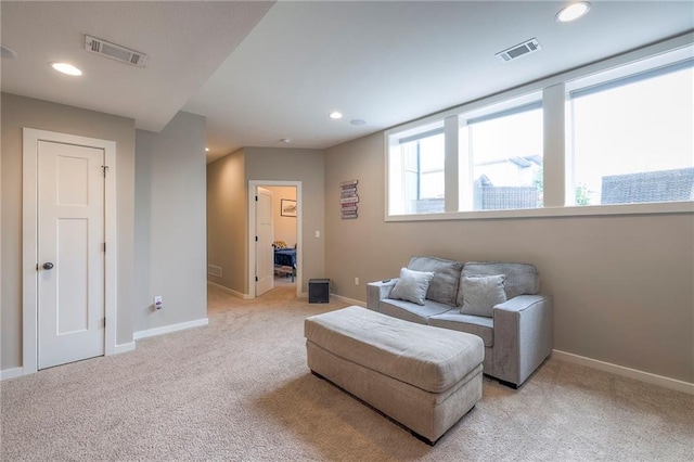 17304 S Schweiger Dr, Olathe, KS 66062 - living area featuring light colored carpet, recessed lighting, and baseboards