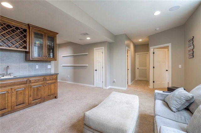 17304 S Schweiger Dr, Olathe, KS 66062 - living area featuring light carpet, recessed lighting, baseboards, and wet bar