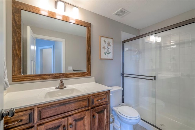 17304 S Schweiger Dr, Olathe, KS 66062 - bathroom with toilet, vanity, and a stall shower