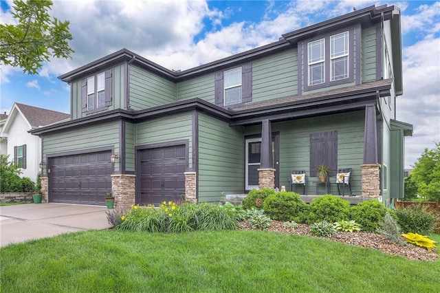 17304 S Schweiger Dr, Olathe, KS 66062 - view of front of property featuring stone siding, a garage, a front lawn, and driveway