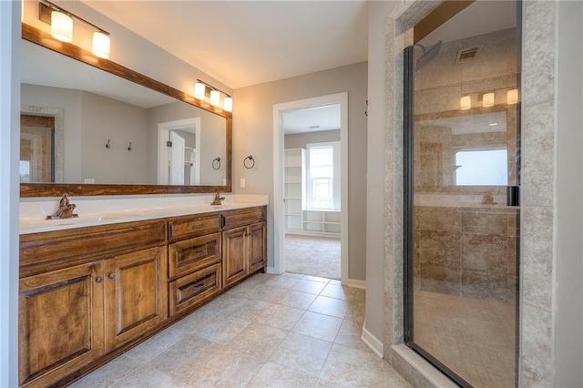17304 S Schweiger Dr, Olathe, KS 66062 - full bath with double vanity, a stall shower, and tile patterned floors
