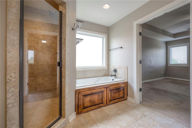 17304 S Schweiger Dr, Olathe, KS 66062 - full bath with a bath, a shower stall, tile patterned flooring, and recessed lighting