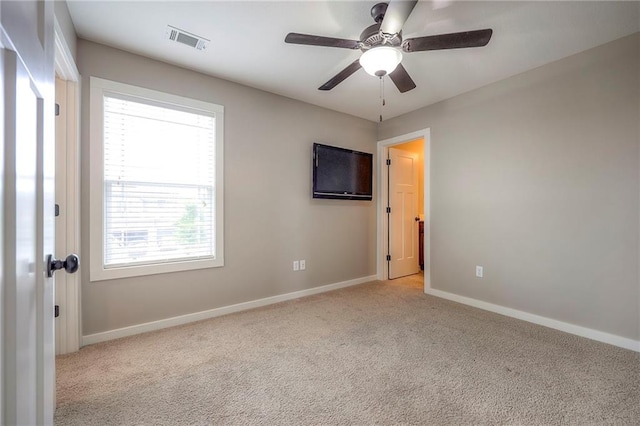 17304 S Schweiger Dr, Olathe, KS 66062 - carpeted spare room with baseboards and ceiling fan