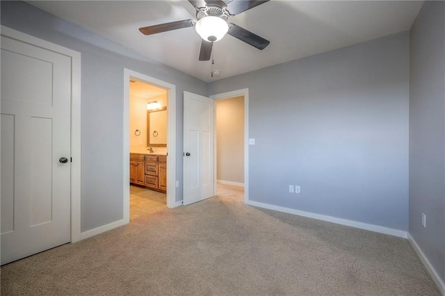 17304 S Schweiger Dr, Olathe, KS 66062 - unfurnished bedroom with light colored carpet, ceiling fan, and ensuite bath