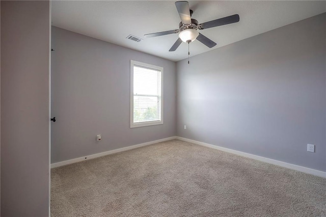 17304 S Schweiger Dr, Olathe, KS 66062 - carpeted spare room with a ceiling fan and baseboards