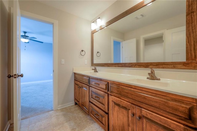 17304 S Schweiger Dr, Olathe, KS 66062 - bathroom featuring double vanity and ceiling fan