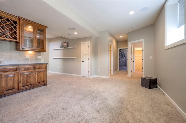 17304 S Schweiger Dr, Olathe, KS 66062 - unfurnished living room featuring light colored carpet and recessed lighting