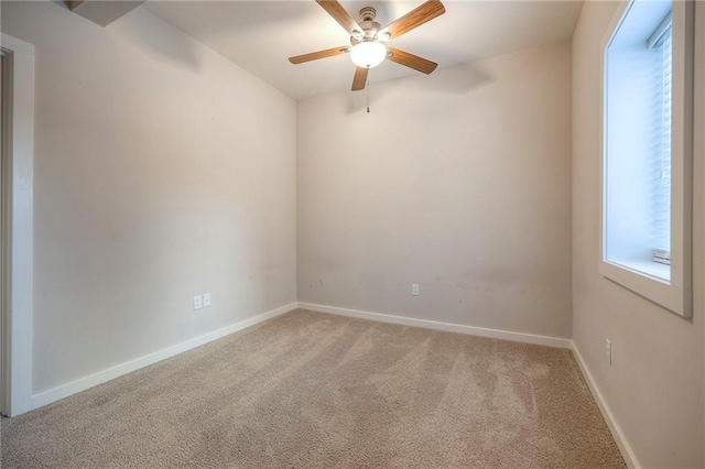 17304 S Schweiger Dr, Olathe, KS 66062 - carpeted spare room with a ceiling fan and baseboards