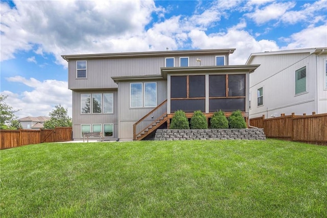 17304 S Schweiger Dr, Olathe, KS 66062 - rear view of property featuring a sunroom, stairs, and a fenced backyard