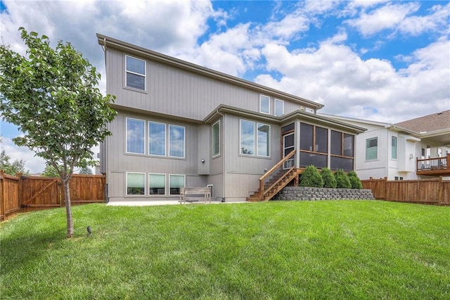 17304 S Schweiger Dr, Olathe, KS 66062 - rear view of property with a sunroom, a fenced backyard, stairs, and a patio