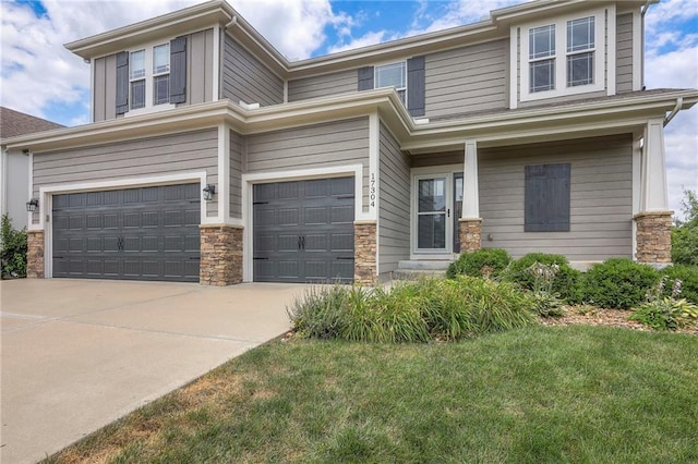 17304 S Schweiger Dr, Olathe, KS 66062 - view of front of property featuring stone siding, an attached garage, driveway, and a front yard