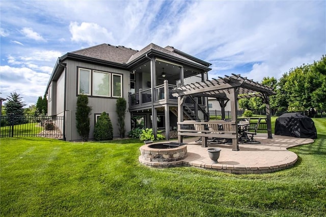 17224 Haskins St, Overland Park, KS 66062 - rear view of house with an outdoor fire pit, a patio area, a pergola, a ceiling fan, and roof with shingles
