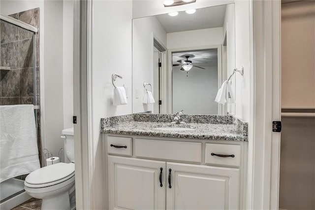 17224 Haskins St, Overland Park, KS 66062 - bathroom with vanity, a shower stall, and a ceiling fan