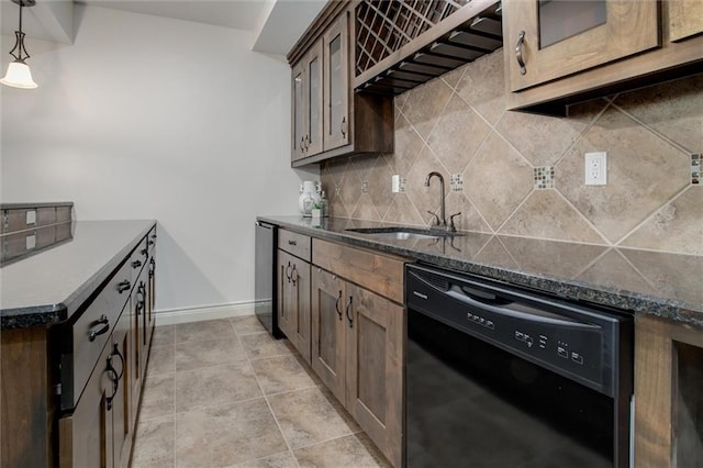 17224 Haskins St, Overland Park, KS 66062 - kitchen featuring dishwasher, decorative backsplash, dark stone counters, decorative light fixtures, and dark brown cabinetry