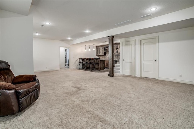 17224 Haskins St, Overland Park, KS 66062 - living area featuring a dry bar, carpet, and recessed lighting