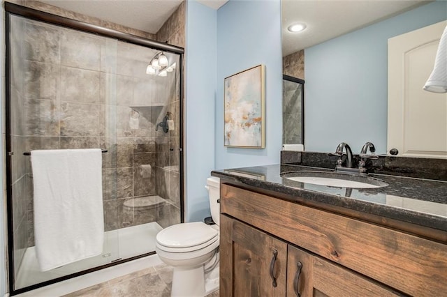 17224 Haskins St, Overland Park, KS 66062 - bathroom with vanity, a shower stall, and recessed lighting