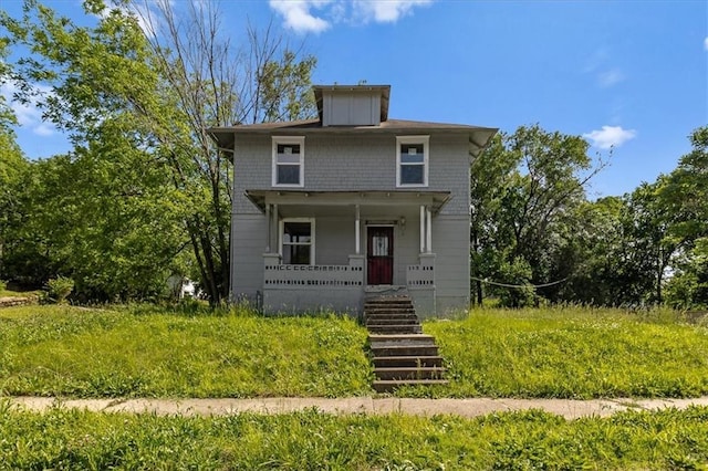2921 E 54th St, Kansas City, MO 64130 - american foursquare style home featuring stairway and covered porch