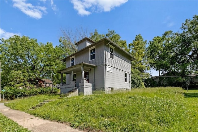 2921 E 54th St, Kansas City, MO 64130 - view of front of property with covered porch