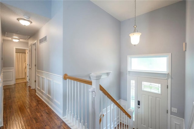 23600 W 59th St, Shawnee, KS 66226 - entrance foyer with a decorative wall, a wainscoted wall, and hardwood / wood-style flooring