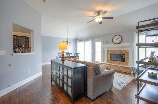 23600 W 59th St, Shawnee, KS 66226 - living area with baseboards, a ceiling fan, plenty of natural light, dark wood finished floors, and vaulted ceiling