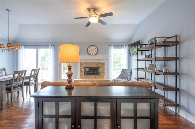 23600 W 59th St, Shawnee, KS 66226 - living area featuring vaulted ceiling, plenty of natural light, a chandelier, dark wood finished floors, and a ceiling fan