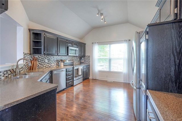 23600 W 59th St, Shawnee, KS 66226 - kitchen featuring stainless steel appliances, a sink, vaulted ceiling, open shelves, and dark wood finished floors