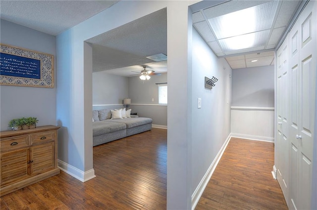 23600 W 59th St, Shawnee, KS 66226 - hallway featuring hardwood / wood-style flooring and baseboards