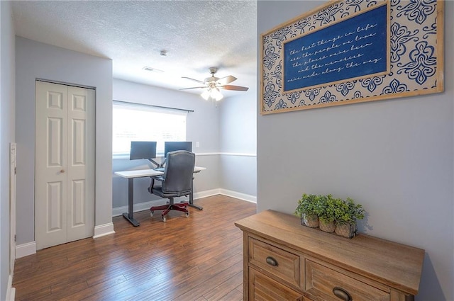 23600 W 59th St, Shawnee, KS 66226 - home office with a ceiling fan, dark wood-style floors, baseboards, and a textured ceiling