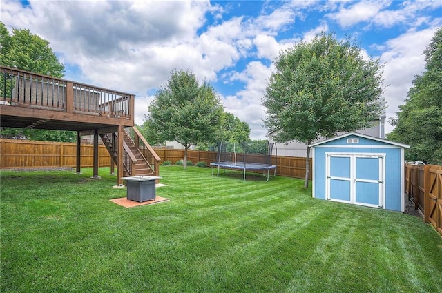 23600 W 59th St, Shawnee, KS 66226 - view of yard with a trampoline, stairs, and a deck