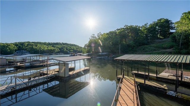 1145 Camp Branch Rd, Sunrise Beach, MO 65079 - dock featuring a water view and boat lift