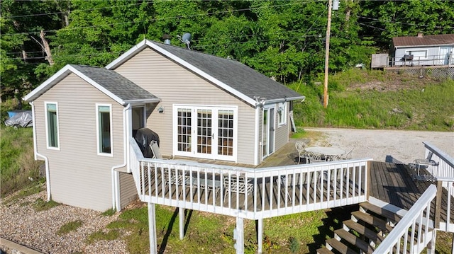 1145 Camp Branch Rd, Sunrise Beach, MO 65079 - rear view of property with a wooden deck and roof with shingles