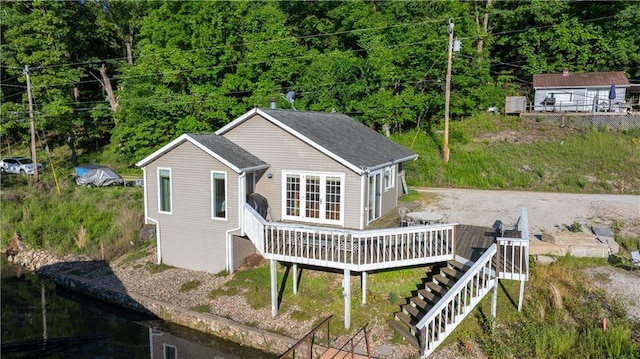 1145 Camp Branch Rd, Sunrise Beach, MO 65079 - rear view of house with a deck, stairs, and a shingled roof